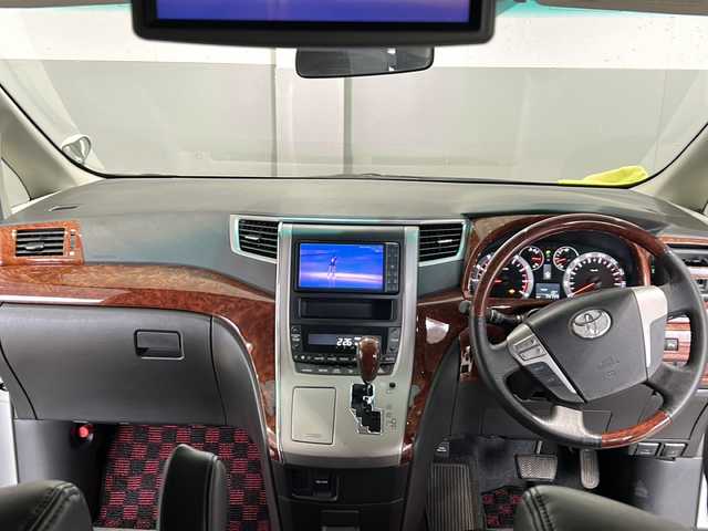 トヨタ アルファード 240S プライムセレクションⅡ 茨城県 2010(平22)年 7.5万km ホワイトパールクリスタルシャイン 純正HDDナビ/【フルセグTV/CD/DVD/Bluetooth/HDD】/バックカメラ/純正フリップダウンモニター/両側パワースライドドア/パワーバックドア/コーナーセンサー/横滑り防止装置/オートライト/社外20インチAW/社外サス/ETC/ウッドコンビステアリング/ステアリングスイッチ/社外フロアマット/プッシュスタート/スマートキー