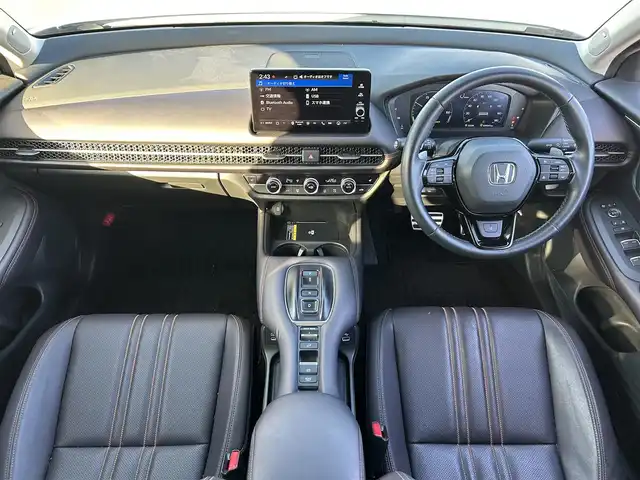 ホンダ ＺＲ－Ｖ ハイブリッド e:HEV Z 岡山県 2024(令6)年 4万km プラチナホワイトパール 登録時走行距離39348km/純正9インチナビ/フルセグTV(AM.FM.TV.BT)/全方位カメラ/ETC2.0/ブラインドスポットモニター/シートヒーター/ステアリングヒーター/クリアランスソナー/衝突軽減ブレーキ/横滑り防止装置/クルーズコントロール(追従走行あり)/車線逸脱警報（レーンキープアシスト）/オートライト/オートマチックハイビーム/アイドリングストップ/電動リアゲート/18インチ純正AW/純正フロアマット/レザーシート/D+N席パワシート/保証書/取扱説明書