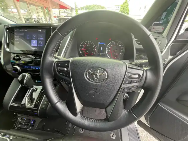 トヨタ アルファード S 長崎県 2021(令3)年 3.5万km ホワイトパールクリスタルシャイン 登録時34641km/純正ディスプレイオーディオ/Bluetooth/USB/AM.FM/バックカメラ/ビルトインETC/レーダークルーズコントロール/サンルーフ/両側パワースライドドア/電子パーキング/オットマン/フリップダウン/モデリスタエアロ/前後ドライブレコーダー/前後クリアランスソーナー/社外テールランプ/社外アルミホイール