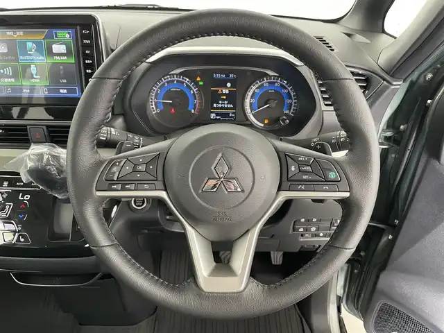 三菱 デリカミニ T プレミアム 富山県 2025(令7)年 0.1千km 緑Ⅱ 登録済未使用車/4WD/純正9型DA（AM/FM/CD/DVD/USB/BT）/バックカメラ/デジタルインナーミラー/両側パワースライドドア/衝突被害軽減ブレーキ/アダプティブクルーズコントロール/レーンキープアシスト/オートマチックハイビーム/LEDヘッドライト/クリアランスソナー/ハーフレザーシート/前席シートヒーター/純正15インチAW/スマートキー×２/プッシュスタート/純正フロアマット/取扱説明書/保証書