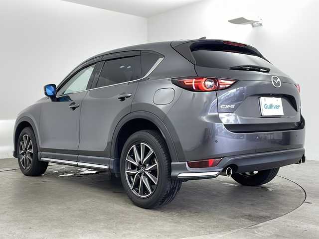 マツダ ＣＸ－５ 25S Lパッケージ 兵庫県 2017(平29)年 7.2万km マシーングレープレミアムM ・純正ナビ&TV&CD&DVD&BT&USB&AUX/・BOSEサウンドシステム/・バック＆サイドカメラ/・社外フリップダウンモニター/・衝突軽減ブレーキ/・レーンキープアシスト/・クリアナンスソナー/・レーダークルーズコントロール/・レザーシート/・前席パワーシート/・全席シートヒーター/・ステアリングヒーター/・ETC/・前後ドライブレコーダー/・パワーバックドア/・LEDライト/・純正19インチアルミホイール/・純正フロアマット/・革巻きステアリング/・電動パーキングブレーキ/・ブレーキホールド/・アイドリングストップ/・スマートキー/・プッシュスタート/・カーテンエアバック/・W＋サイドエアバック