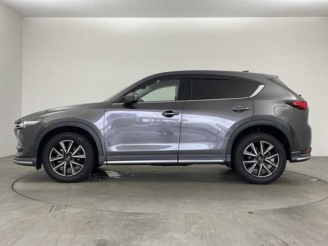 マツダ ＣＸ－５ 25S Lパッケージ 兵庫県 2017(平29)年 7.2万km マシーングレープレミアムM ・純正ナビ&TV&CD&DVD&BT&USB&AUX/・BOSEサウンドシステム/・バック＆サイドカメラ/・社外フリップダウンモニター/・衝突軽減ブレーキ/・レーンキープアシスト/・クリアナンスソナー/・レーダークルーズコントロール/・レザーシート/・前席パワーシート/・全席シートヒーター/・ステアリングヒーター/・ETC/・前後ドライブレコーダー/・パワーバックドア/・LEDライト/・純正19インチアルミホイール/・純正フロアマット/・革巻きステアリング/・電動パーキングブレーキ/・ブレーキホールド/・アイドリングストップ/・スマートキー/・プッシュスタート/・カーテンエアバック/・W＋サイドエアバック
