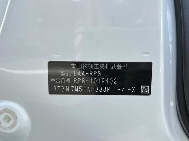 ホンダ ステップワゴン スパーダ eHEV 大阪府 2022(令4)年 6.1万km プラチナホワイトパール 衝突軽減　純正１１.4インチナビ フリップダウンモニター　両側パワースライドドア　ＢＳＭ　レーダークルーズコントロール　マルチビュー　プラズマクラスター　デュアルエアコン　運転支援　コーナーセンサー　電動リアゲート　前列シートヒーター　フルセグテレビ　オットマン　プッシュスタート　パワーバックドア　ETC　LEDヘッドライト　スマートキー　ハーフレザーシート