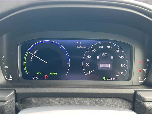 ホンダ ステップワゴン スパーダ eHEV 大阪府 2022(令4)年 6.1万km プラチナホワイトパール 衝突軽減　純正１１.4インチナビ フリップダウンモニター　両側パワースライドドア　ＢＳＭ　レーダークルーズコントロール　マルチビュー　プラズマクラスター　デュアルエアコン　運転支援　コーナーセンサー　電動リアゲート　前列シートヒーター　フルセグテレビ　オットマン　プッシュスタート　パワーバックドア　ETC　LEDヘッドライト　スマートキー　ハーフレザーシート