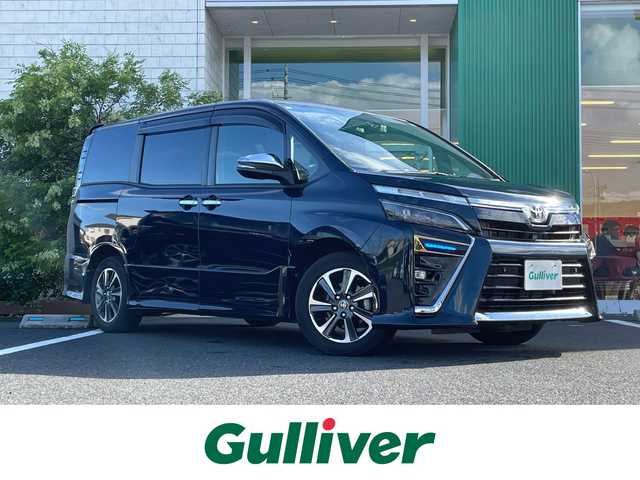 トヨタ ヴォクシー ZS 煌Ⅲ 岡山県 2020(令2)年 2.2万km ブラッキッシュアゲハガラスフレーク 純正9インチナビ/フルセグTV、CD、DVD、AM、FM/Bluetooth/純正12インチフリップダウンモニター/バックカメラ/ETC/前後ドライブレコーダー/クルーズコントロール/TVキャンセラー/両側パワースライドドア/トヨタセーフティセンス