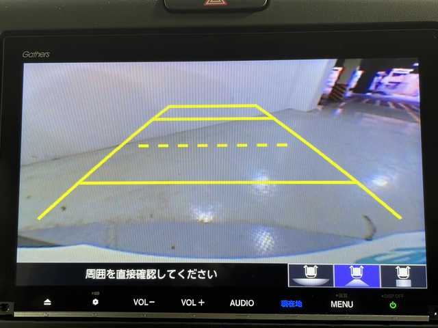 ホンダ フリード ハイブリット G ホンダセンシング 広島県 2021(令3)年 1.4万km スーパープラチナグレーメタリック 純正９型ナビ　/両側パワースライドドア　/後席モニター　/レーダークルーズコントロール　/フルセグ　/バックカメラ　/レーンキープアシスト　/衝突軽減ブレーキ　/コーナーセンサー　/オートライト　/ドラレコ　/ETC/純正15インチアルミホイール（185/65/R15)/エアバック（運転席/助手席）