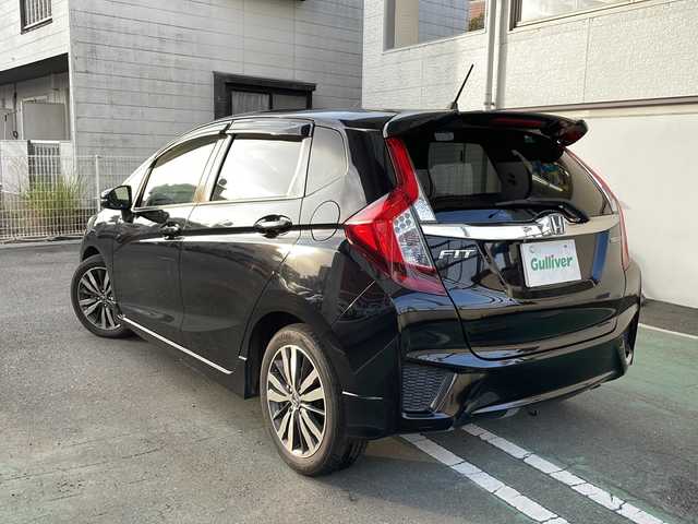 ホンダ フィット ハイブリット Sパッケージ 宮崎県 2014(平26)年 6.8万km クリスタルブラックパール ＳＤナビ　前後ドライブレコーダー　ＥＴＣ Bluetooth バックカメラ フルセグTV USB入力端子 クルーズコントロール（追尾なし) LEDライト HDMI搭載 電動格納ミラー オートライト 純正フロアマット 純正アルミホイール 取扱説明書 保証書