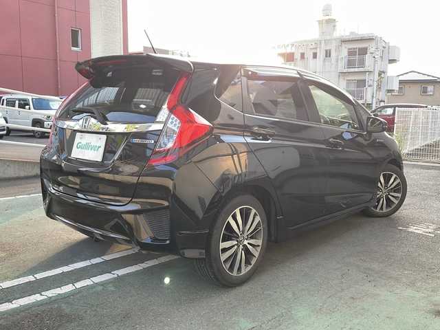 ホンダ フィット ハイブリット Sパッケージ 宮崎県 2014(平26)年 6.8万km クリスタルブラックパール ＳＤナビ　前後ドライブレコーダー　ＥＴＣ Bluetooth バックカメラ フルセグTV USB入力端子 クルーズコントロール（追尾なし) LEDライト HDMI搭載 電動格納ミラー オートライト 純正フロアマット 純正アルミホイール 取扱説明書 保証書