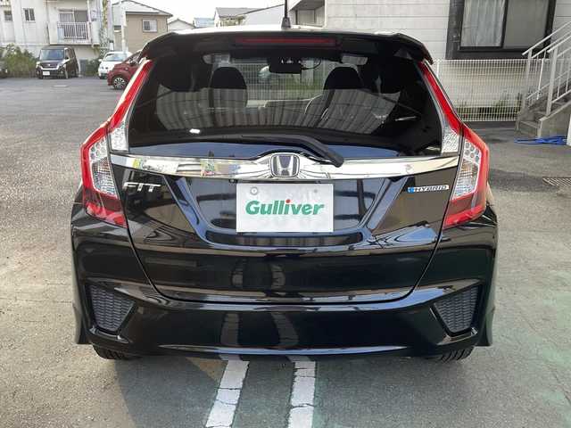 ホンダ フィット ハイブリット Sパッケージ 宮崎県 2014(平26)年 6.8万km クリスタルブラックパール ＳＤナビ　前後ドライブレコーダー　ＥＴＣ Bluetooth バックカメラ フルセグTV USB入力端子 クルーズコントロール（追尾なし) LEDライト HDMI搭載 電動格納ミラー オートライト 純正フロアマット 純正アルミホイール 取扱説明書 保証書