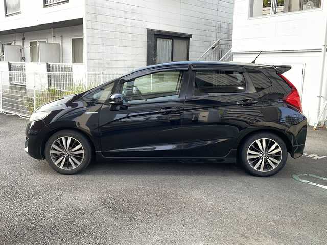 ホンダ フィット ハイブリット Sパッケージ 宮崎県 2014(平26)年 6.8万km クリスタルブラックパール ＳＤナビ　前後ドライブレコーダー　ＥＴＣ Bluetooth バックカメラ フルセグTV USB入力端子 クルーズコントロール（追尾なし) LEDライト HDMI搭載 電動格納ミラー オートライト 純正フロアマット 純正アルミホイール 取扱説明書 保証書