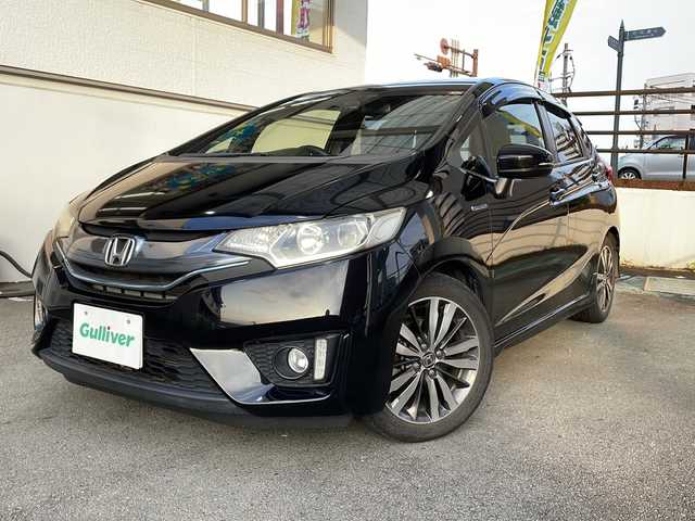 ホンダ フィット ハイブリット Sパッケージ 宮崎県 2014(平26)年 6.8万km クリスタルブラックパール ＳＤナビ　前後ドライブレコーダー　ＥＴＣ Bluetooth バックカメラ フルセグTV USB入力端子 クルーズコントロール（追尾なし) LEDライト HDMI搭載 電動格納ミラー オートライト 純正フロアマット 純正アルミホイール 取扱説明書 保証書