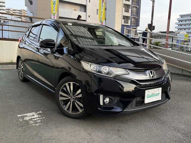ホンダ フィット ハイブリット Sパッケージ 宮崎県 2014(平26)年 6.8万km クリスタルブラックパール ＳＤナビ　前後ドライブレコーダー　ＥＴＣ Bluetooth バックカメラ フルセグTV USB入力端子 クルーズコントロール（追尾なし) LEDライト HDMI搭載 電動格納ミラー オートライト 純正フロアマット 純正アルミホイール 取扱説明書 保証書