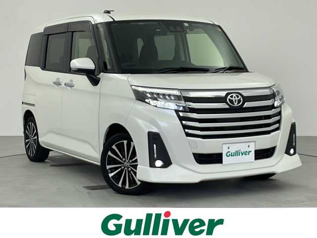 トヨタ ルーミー カスタムG－T 愛知県 2023(令5)年 4万km パールホワイトⅢ 純正ナビ(NSZT-Y68T)/バックカメラ/両側パワースライドドア/フルセグTV・Bluetooth・CD・AM・FM/ETC2.0/前ドライブレコーダー/純正15インチアルミホイール/スマートアシスト/衝突回避支援ブレーキ/衝突警報/車線逸脱警報/露側逸脱警報/ふらつき警報/ブレーキ制御付誤発進抑制(前方・後方)/先行車発進お知らせ/アダプティブドライビングビーム/LEDヘッドライト/オートライト/フロントフォグランプ/サイドビューランプ/標識認識/前後コーナーセンサー/全車速追従機能付ACC(停止保持機能あり)/横滑り防止/アイドリングストップ/ヒルスタートアシスト/ファブリックシート/運転席助手席シートヒーター/純正フロアマット/革巻きステアリング/シートバックテーブル×2/リヤサンシェード/充電用USB/電子パーキングブレーキ/ブレーキホールド/スマートキー/プッシュスタート/スペアキー1本/取扱説明書・ナビ説明書