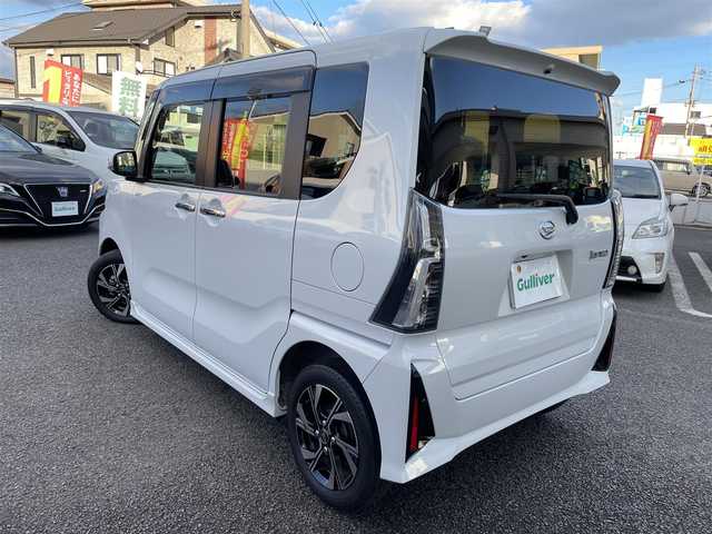 ダイハツ タント カスタム X 大分県 2022(令4)年 1.5万km シャイニングホワイトパール 社外メモリナビ CN-HA02WD/【フルセグ/DVD/BTオーディオ】/バックカメラ/両側パワースライドドア/ブラックハーフレザー調シート/純正14インチアルミホイール/スマートアシスト/クリアランスソナー/充電用USBソケット/電動パーキングブレーキ/前席シートヒーター/ETC/LEDヘッドライト/LEDフォグランプ/オートライト/ウインカーミラー/ステアリングリモコン/チルトステアリング/エンジンプッシュスタート/横滑り防止装置/アイドリングストップ/運転席シートリフター/リアプライバシーガラス/ドアバイザー/フロアマット/オートリトラミラー/カーテン＆サイド＆Wエアバッグ/ABS/スマートキー×2/保証書/車両取説