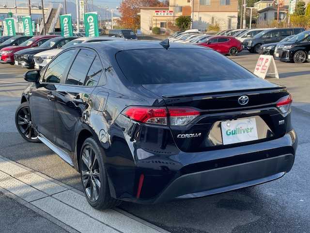 トヨタ カローラ ハイブリット ダブルバイビー 静岡県 2020(令2)年 2.6万km スパークリングブラックパールクリスタルシャイン ●純正ディスプレイオーディオ（ナビ機能付き）/(フルセグ/Bluetooth)/●ハーフレザーシート/●前席シートヒーター/●バックカメラ/●レーダークルーズコントロール/●プリクラッシュセーフティ/●レーンキープアシスト/●前後クリアランスソナー/●電動パーキングブレーキ/●オートブレーキホールド/●LEDヘッドライト＆フォグランプ/●オートライト/●オートマチックハイビーム/●革巻きステアリング/●ステアリングスイッチ/●ステアリングヒーター/●ETC2.0/●電動格納ウィンカーミラー/●レベライザー/●スマートキー/●プッシュスタート/●純正フロアマット/●純正17インチアルミホイール/●ダブル＋サイド＋ニーSRS＋ABS