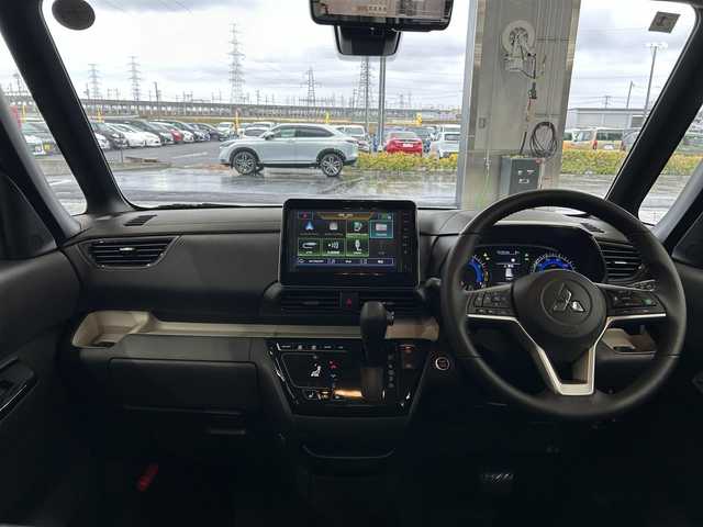 三菱 デリカミニ T プレミアム 千葉県 2025(令7)年 0.1千km パールⅡ 届出済未使用車　/純正９型ディスプレイ　/全周囲カメラ　/デジタルミラー　/マイパイロット　/両側パワースライドドア　/シートヒーター　/衝突軽減ブレーキ　/車線維持支援　/レーンチェンジアシスト　/オートハイビーム/スマートフォン連携/サイドデカール/ルーフブラック
