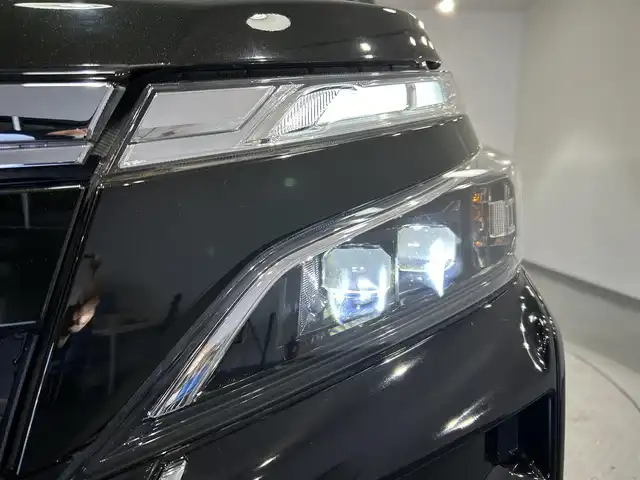 トヨタ ヴォクシー ZS 煌 愛知県 2018(平30)年 2.9万km イナズマスパーキングブラックガラスフレーク 純正１０インチナビ(NSZN-Z66T)/フルセグTV・CD／DVD・Bluetooth・FM／AM/バックカメラ/純正フリップダウンモニター(V12T-R66C)/黒革調シートカバー/クルーズコントロール/両側電動スライドドア/衝突軽減ブレーキ/純正ビルトインＥＴＣ/純正ドライブレコーダー/ＬＥＤヘッドライト/2列目ロールサンシェード/USB充電/オートハイビーム