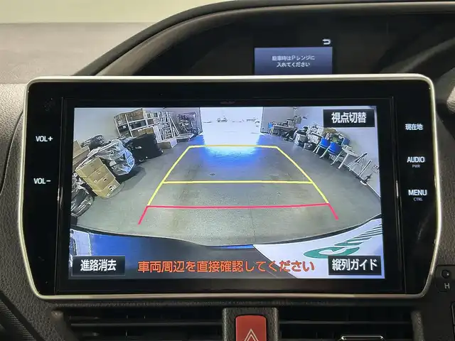 トヨタ ヴォクシー ZS 煌 愛知県 2018(平30)年 2.9万km イナズマスパーキングブラックガラスフレーク 純正１０インチナビ(NSZN-Z66T)/フルセグTV・CD／DVD・Bluetooth・FM／AM/バックカメラ/純正フリップダウンモニター(V12T-R66C)/黒革調シートカバー/クルーズコントロール/両側電動スライドドア/衝突軽減ブレーキ/純正ビルトインＥＴＣ/純正ドライブレコーダー/ＬＥＤヘッドライト/2列目ロールサンシェード/USB充電/オートハイビーム