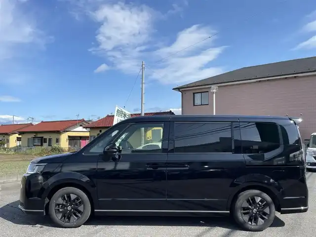 ホンダ ステップワゴン スパーダ 千葉県 2024(令6)年 0.5万km クリスタルブラックパール ワンオーナー/11.4インチ純正メモリナビ、地デジ、Bluetooth、CD、DVD/　（LXM-247VFNi）/バックカメラ/ホンダセンシング/パドルシフト/ウインカーミラー/革巻きステア/ハーフレザーシート/前席シートヒーター/両側パワースライドドア/パワーバックドア/レーダークルーズコントロール/W・サイド・カーテンエアバッグ/ETC/LEDヘッドライト/コーナーセンサー（前後）/２列目オットマン/ブラインドスポットインフォメーション/保証書、取説