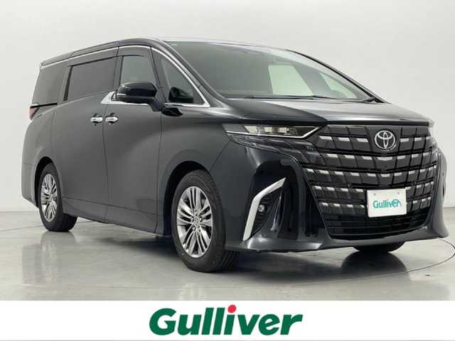 トヨタ アルファード Z 熊本県 2024(令6)年 1万km ブラック 左右独立ムーンルーフ　/純正１４インチディスプレイオーディオプラス　/全周囲カメラ　/純正前後ドライブレコーダー　/１３．２型後席モニター　/ビルトインETC2.0/両側パワースライドドア　/前後クリアランスソナー　/トヨタセーフティーセンス/・プリクラッシュセーフティ/・レーントレーシングアシスト/・レーンディパーチャーアラート/・レーダークルーズコントロール/・アダプティブハイビームアシスト/・オートマチックハイビーム/・ロードサインアシスト/・ドライバー異常対応システム/・プロアクティブドライビングアシスト/・発進遅れ告知機能/・ブラインドスポットモニター/横滑り防止/前席・2列目シートヒーター/前席・2列目エアーシート/全席パワーシート/2列目オットマン/デジタルインナーミラー/置くだけ充電/１００V充電/パワーバックドア/ユニバーサルステップ/オートライト/LEDヘッドライト/フォグライト/スマートキー/プッシュスタート/スペアキー1本/保証書　/取扱説明書