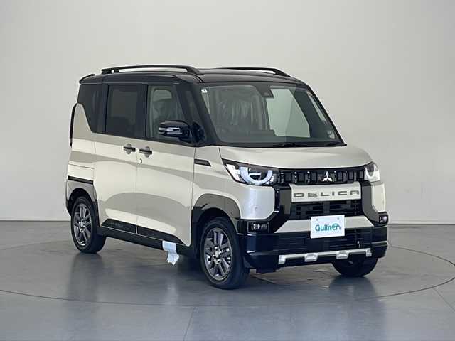 三菱 デリカミニ T プレミアム 長野県 2025(令7)年 0.1千km ベージュＭ 登録済未使用車/4WD/純正9インチディスプレイオーディオ/（Bluetooth／AppleCarPlay／AndroidAuto）/360°カメラ/前席シートヒーター/ステアリングヒーター/両側電動スライドドア（ハンズフリー）/デジタルインナーミラー/後席サンシェード/衝突軽減ブレーキ/車線逸脱防止支援機能/マイパイロット/前後コーナーセンサー/ハーフレザーシート/電子パーキング/ヘッドライトレベライザー/スマートキー/スペアキー/取扱説明書/保証書