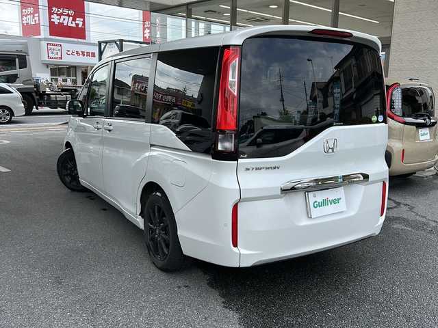 ホンダ ステップワゴン G ホンダセンシング 埼玉県 2018(平30)年 4.7万km プラチナホワイトパール 福祉車両/ナビ装着用スペシャルパッケージ＋ETC車載器(ナビゲーション連動)/Honda SENSING/クルーズコントロール/1列目シート用i-サイドエアバッグシステム＋サイドカーテンエアバッグシステム(1-3列目シート対応)/リア左側パワースライドドア＋スライドドア・イージークローザー（リア両側）/リア右側パワースライドドア/コンフォートビューパッケージ/IRカット(遮熱)＋スーパーUVカットフロントドアガラス/プラズマクラスター機能/トリプルゾーンコントロール・フルオートエアコンディショナー/LEDヘッドライト(オートレベリング/オートライトコントロール機構付)
