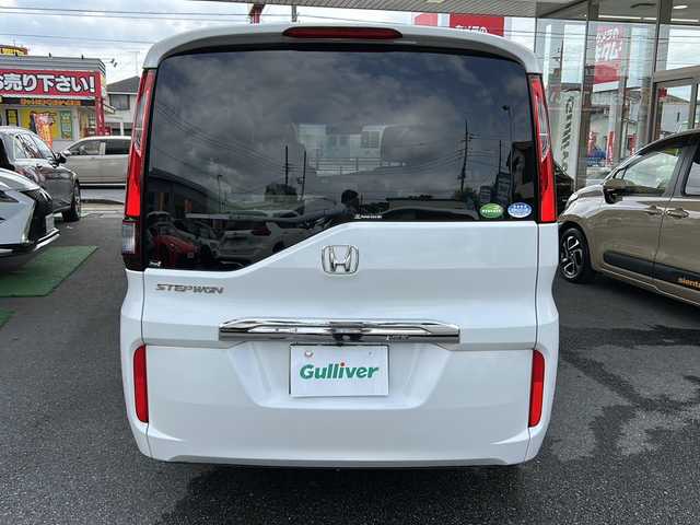 ホンダ ステップワゴン G ホンダセンシング 埼玉県 2018(平30)年 4.7万km プラチナホワイトパール 福祉車両/ナビ装着用スペシャルパッケージ＋ETC車載器(ナビゲーション連動)/Honda SENSING/クルーズコントロール/1列目シート用i-サイドエアバッグシステム＋サイドカーテンエアバッグシステム(1-3列目シート対応)/リア左側パワースライドドア＋スライドドア・イージークローザー（リア両側）/リア右側パワースライドドア/コンフォートビューパッケージ/IRカット(遮熱)＋スーパーUVカットフロントドアガラス/プラズマクラスター機能/トリプルゾーンコントロール・フルオートエアコンディショナー/LEDヘッドライト(オートレベリング/オートライトコントロール機構付)