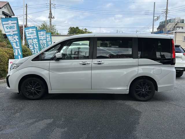 ホンダ ステップワゴン G ホンダセンシング 埼玉県 2018(平30)年 4.7万km プラチナホワイトパール 福祉車両/ナビ装着用スペシャルパッケージ＋ETC車載器(ナビゲーション連動)/Honda SENSING/クルーズコントロール/1列目シート用i-サイドエアバッグシステム＋サイドカーテンエアバッグシステム(1-3列目シート対応)/リア左側パワースライドドア＋スライドドア・イージークローザー（リア両側）/リア右側パワースライドドア/コンフォートビューパッケージ/IRカット(遮熱)＋スーパーUVカットフロントドアガラス/プラズマクラスター機能/トリプルゾーンコントロール・フルオートエアコンディショナー/LEDヘッドライト(オートレベリング/オートライトコントロール機構付)