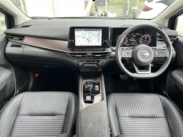 日産 オーラ G FOUR レザーエディション 岩手県 2024(令6)年 1.4万km ミッドナイトブラック/サンライズカッパー ４WD/ワンオーナー　/日産純正コネクトナビ　/フルセグTV/ブルートゥース/ＢＯＳＥスピーカー　/黒レザーシート　/全方位モニター　/プロパイロット　/デジタルインナーミラー　/置くだけ充電　/シートヒーター　/ビルトインＥＴＣ２．０　/ハンドルヒーター/BSM/プッシュスタート/スペアキー/フロアマット/ドアバイザー/保証書　取説　ナビ取説