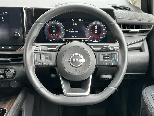 日産 オーラ G FOUR レザーエディション 岩手県 2024(令6)年 1.4万km ミッドナイトブラック/サンライズカッパー ４WD/ワンオーナー　/日産純正コネクトナビ　/フルセグTV/ブルートゥース/ＢＯＳＥスピーカー　/黒レザーシート　/全方位モニター　/プロパイロット　/デジタルインナーミラー　/置くだけ充電　/シートヒーター　/ビルトインＥＴＣ２．０　/ハンドルヒーター/BSM/プッシュスタート/スペアキー/フロアマット/ドアバイザー/保証書　取説　ナビ取説