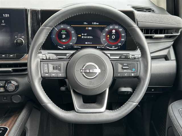 日産 オーラ G FOUR レザーエディション 岩手県 2024(令6)年 1.4万km ミッドナイトブラック/サンライズカッパー ４WD/ワンオーナー　/日産純正コネクトナビ　/フルセグTV/ブルートゥース/ＢＯＳＥスピーカー　/黒レザーシート　/全方位モニター　/プロパイロット　/デジタルインナーミラー　/置くだけ充電　/シートヒーター　/ビルトインＥＴＣ２．０　/ハンドルヒーター/BSM/プッシュスタート/スペアキー/フロアマット/ドアバイザー/保証書　取説　ナビ取説