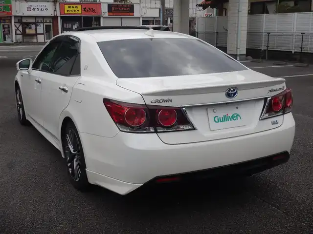 トヨタ クラウン ハイブリッド アスリートG 静岡県 2017(平29)年 9.5万km ホワイトパールクリスタルシャイン PCS（衝突軽減ブレーキ）/LDA(車線逸脱警報)/BSM（ブラインドスポットモニター）/レーダークルーズコントロール/オートライト/オートハイビーム/フォグライト/サンルーフ/本革シート/前席シートヒーター/エアーシート/前席パワーシート/純正ナビゲーション/・Bluetooth接続/・AM/・FM/・AUX/・地デジ/・ブルーレイ/・DVD/・SD/2.0ETC/純正フロアマット/マニュアルモード付AT/プッシュスタート/スマートキー×2/運転席シートメモリー/ウインカー付きドアミラー/社外ガングリップステアリング/新車保証書