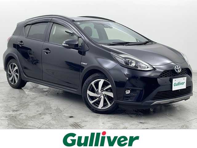 トヨタ アクア クロスオーバー グラム 宮城県 2018(平30)年 5.4万km ブラックマイカ ハーフレザーシート/トヨタセーフティセンス/・プリクラッシュセーフティ/・レーンディパチャーアラート/・オートハイビーム/・クリアランスソナー（前後）/純正9型ナビ/ナビロックの為確認不可/バックカメラ/LEDヘッドライト/LEDフォグライト/純正ドライブレコーダー（フロント）/ビルドインETC/革巻きステアリング/ステアリングスイッチ/プッシュスタート/スマートキー/純正フロアマット/純正16インチアルミホイール/ドアバイザー/横滑り防止装置