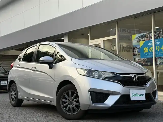 ホンダ フィット 13G Lパッケージ 長崎県 2016(平28)年 4.8万km アラバスターシルバーメタリック 純正SDナビ(FM/AM/BT/ワンセグTV)/プッシュスタート/クルーズコントロール/ETC/バックカメラ/純正フロアマット/社外14インチアルミホイール/オートライト/ABS/TCS/VSA/イモビライザー/スマートキー