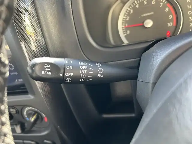 スズキ ジムニー クロスアドベンチャー XC 東京都 2012(平24)年 12.5万km ブルーイッシュブラックパール3 2インチアップ/社外ディスプレイオーディオ/　Bluetooth/AM・FM/AppleCarPlay/AndroidAuto/社外マフラー/社外リアスポイラー/シートヒーター/純正ハーフレザーシート/純正フロアマット/パワーウィンドウ/パワーステアリング/電動格納ミラー/ウインカーミラー/ドアバイザー/リモコンキー/保証書