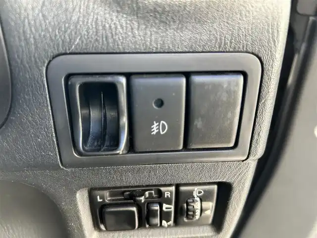 スズキ ジムニー クロスアドベンチャー XC 東京都 2012(平24)年 12.5万km ブルーイッシュブラックパール3 2インチアップ/社外ディスプレイオーディオ/　Bluetooth/AM・FM/AppleCarPlay/AndroidAuto/社外マフラー/社外リアスポイラー/シートヒーター/純正ハーフレザーシート/純正フロアマット/パワーウィンドウ/パワーステアリング/電動格納ミラー/ウインカーミラー/ドアバイザー/リモコンキー/保証書