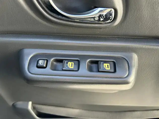 スズキ ジムニー クロスアドベンチャー XC 東京都 2012(平24)年 12.5万km ブルーイッシュブラックパール3 2インチアップ/社外ディスプレイオーディオ/　Bluetooth/AM・FM/AppleCarPlay/AndroidAuto/社外マフラー/社外リアスポイラー/シートヒーター/純正ハーフレザーシート/純正フロアマット/パワーウィンドウ/パワーステアリング/電動格納ミラー/ウインカーミラー/ドアバイザー/リモコンキー/保証書