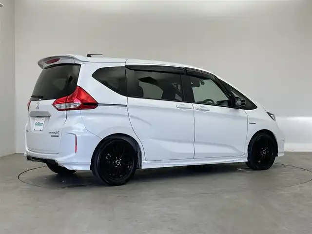 ホンダ フリード ハイブリット モデューロX ホンダセンシング 埼玉県 2021(令3)年 5万km プラチナホワイトパール 純正９インチナビ　バックカメラ　ビルトインＥＴＣ　前後ドライブレコーダー　ホンダセンシング　アダプティブクルーズコントロール　社外アルミホイール　スマートキー　オートライト　ＬＥＤヘッドライト　地デジ