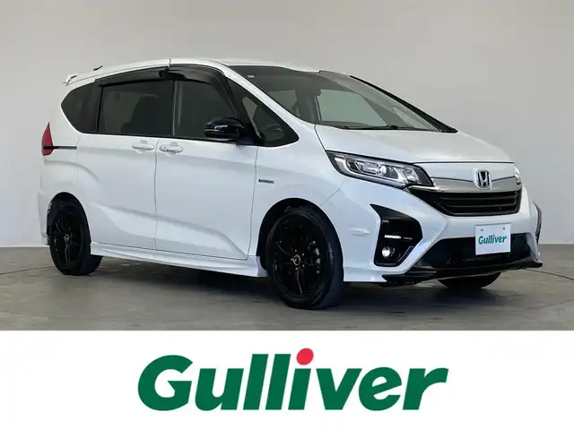 ホンダ フリード ハイブリット モデューロX ホンダセンシング 埼玉県 2021(令3)年 5万km プラチナホワイトパール 純正９インチナビ　バックカメラ　ビルトインＥＴＣ　前後ドライブレコーダー　ホンダセンシング　アダプティブクルーズコントロール　社外アルミホイール　スマートキー　オートライト　ＬＥＤヘッドライト　地デジ