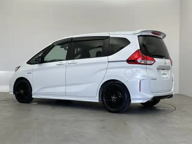 ホンダ フリード ハイブリット モデューロX ホンダセンシング 埼玉県 2021(令3)年 5万km プラチナホワイトパール 純正９インチナビ　バックカメラ　ビルトインＥＴＣ　前後ドライブレコーダー　ホンダセンシング　アダプティブクルーズコントロール　社外アルミホイール　スマートキー　オートライト　ＬＥＤヘッドライト　地デジ