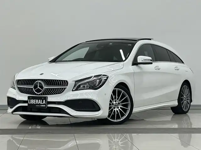 メルセデス・ベンツ ＣＬＡ１８０ Sブレイク AMG スタイル 岡山県 2018(平30)年 3.1万km ポーラホワイト メルセデス純正ナビ/AMGプレミアムパッケージ/パノラマSR/ハーフレザー/シートヒーター/PWシート/リアカメラ/フルセグ/harman/kardon/RSP/ESP/アクティブブレーキA/アテンションA/BSA/レーンキープA/ディストロ+/パドルシフト/ダイナミックセレクト/パワーテールゲート/ETC/前後ドラレコ/アンビエントライト/LEDヘッドライト/AHB