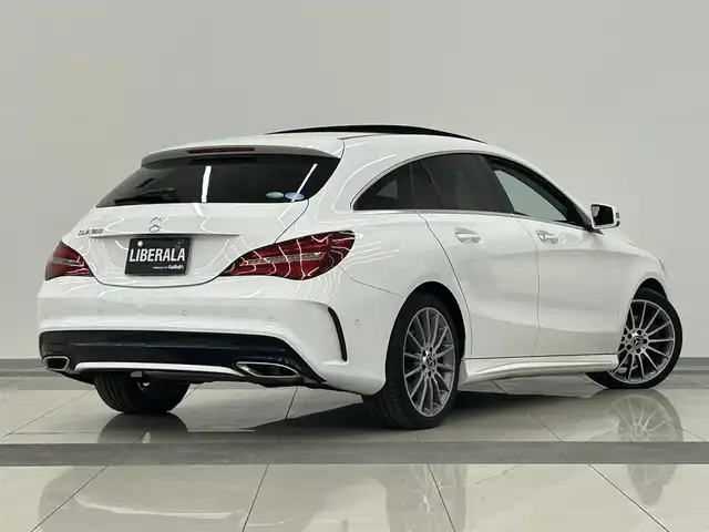 メルセデス・ベンツ ＣＬＡ１８０ Sブレイク AMG スタイル 岡山県 2018(平30)年 3.1万km ポーラホワイト メルセデス純正ナビ/AMGプレミアムパッケージ/パノラマSR/ハーフレザー/シートヒーター/PWシート/リアカメラ/フルセグ/harman/kardon/RSP/ESP/アクティブブレーキA/アテンションA/BSA/レーンキープA/ディストロ+/パドルシフト/ダイナミックセレクト/パワーテールゲート/ETC/前後ドラレコ/アンビエントライト/LEDヘッドライト/AHB