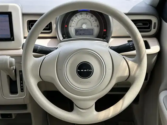 スズキ ラパン L 愛媛県 2016(平28)年 7.4万km シフォンアイボリーM 禁煙車/登録時走行距離：73674km/ディーラーオプション純正ナビ/CD/DVD/iPod/ワンセグTV/CDチェンジャー/前後ドライブレコーダー/衝突被害軽減システム/横滑り防止装置/盗難防止装置/エンジンスタートボタン/アイドリングストップ/シートヒーター/フルフラットシート