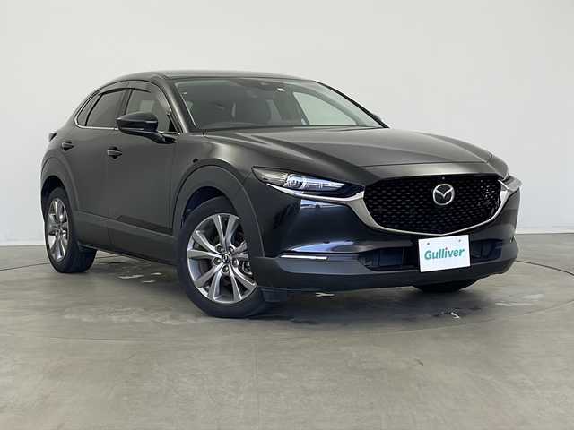 マツダ ＣＸ－３０ XD Lパッケージ 新潟県 2020(令2)年 5.6万km ジェットブラックマイカ 純正メーカーOPナビ/・AM/FM/CD/DVD/Bluetooth/フルセグ/USB/バックモニター/全周囲モニター/レーンキープアシスト/衝突被害軽減システム/ETC/フロントドライブレコーダー/ヘッドアップディスプレイ/純正フロアマット/レザーシート/運転席パワーシート/前席シートヒーター/パーキングアシスト/ステアリングヒーター/純正LEDヘッドライト/オートライト/オートマチックハイビーム/純正18インチAW夏タイヤ/ABS/横滑り防止機能/リアコーナーセンサー/TCS/パドルシフト/スペアキー/保証書