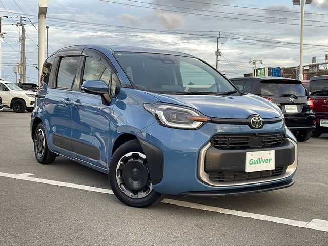 トヨタ シエンタ ハイブリッド Z 徳島県 2023(令5)年 0.8万km グレイッシュブルー 純正10型ナビゲーション/・フルセグTV/CD/DVD/HDMI/Bluetooth/パノラミックビューモニター/フリップダウンモニター/両側パワースライドドア/ブラインドスポットモニター/ドライブレコーダー/シートヒーター/ステアリングヒーター/ミラーヒーター/100V電源/USBポート/ビルトインETC/純正LEDヘッドライト/純正フロアマット/スペアキー1本/トヨタセーフティーセンス/・プリクラッシュセーフティ/・レーンディパーチャーアラート /・レーントレーシングアシスト/・ロードサインアシスト/・先行車発進告知機能/・レーダークルーズコントロール/・アダプティブハイビームシステム