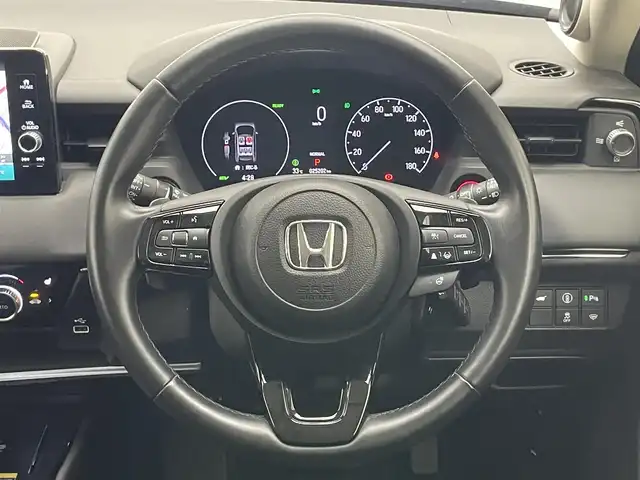 ホンダ ヴェゼル ハイブリッド e:HEV Z 愛知県 2021(令3)年 2.6万km メテオロイドグレーメタリック 純正９型ＤＡナビ　フルセグＴＶ　Ｂｌｕｅｔｏｏｔｈ　ＵＳＢ　全方位カメラ　ホンダセンシング　レーダークルコン　衝突軽減　ＬＥＤヘッドライト　ＢＳＭ　ＥＴＣ２．０　ワイヤレス充電　シートヒーター　禁煙車