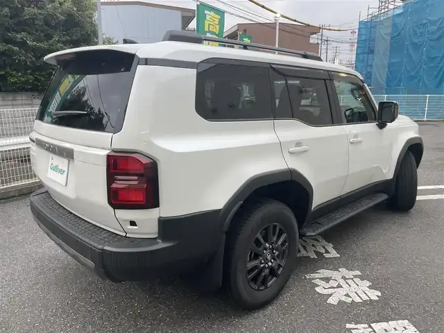 トヨタ ランドクルーザー ２５０ VX 埼玉県 2024(令6)年 0.4万km プラチナホワイトパールマイカ ワンオーナー/トヨタセーフティセンス/・プリクラッシュセーフティ/・レーンディパーチャーアラート/・ブラインドスポットモニター/・クリアランスソナー/・ロードサインアシスト/・レーダークルーズコントロール/純正T-Connectトナビ/　DTV/Bluetooth/　AppleCarPlay/AndroidAuto/　USB/HDMI/Miracast/サンルーフ/パノラミックビューモニター/デジタルインナーミラー/ビルトインETC2.0/パワーバックドア/革巻きステアリング/ステアリングスイッチ/ステアリングヒーター/前席シートヒーター/前席シートベンチレーション/運転席パワーシート/電子パーキング/ブレーキオートホールド/プッシュスタート/スマートキー/丸目LEDヘッドライト/フォグランプ/オートライト/オートマチックハイビーム