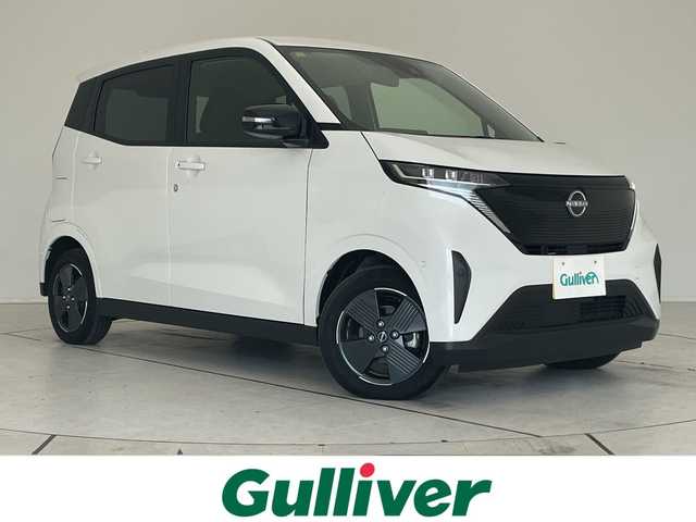 日産 サクラ X 愛知県 2023(令5)年 0.6万km ホワイトパール 純正9型ナビ/バックカメラ/コーナーセンサー/純正アルミホイール/LEDヘッドライト/オートマチックハイビーム/衝突軽減システム/フルセグ/CD DVD/Bluetooth/ステアリングスイッチ/スマートキー/プッシュスタート