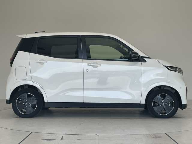 日産 サクラ X 愛知県 2023(令5)年 0.6万km ホワイトパール 純正9型ナビ/バックカメラ/コーナーセンサー/純正アルミホイール/LEDヘッドライト/オートマチックハイビーム/衝突軽減システム/フルセグ/CD DVD/Bluetooth/ステアリングスイッチ/スマートキー/プッシュスタート