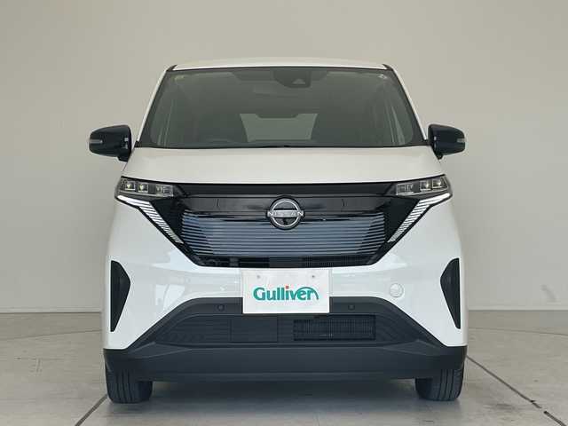 日産 サクラ X 愛知県 2023(令5)年 0.6万km ホワイトパール 純正9型ナビ/バックカメラ/コーナーセンサー/純正アルミホイール/LEDヘッドライト/オートマチックハイビーム/衝突軽減システム/フルセグ/CD DVD/Bluetooth/ステアリングスイッチ/スマートキー/プッシュスタート